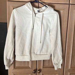 I am selling a white zip up hoodie from shein that is in great condition